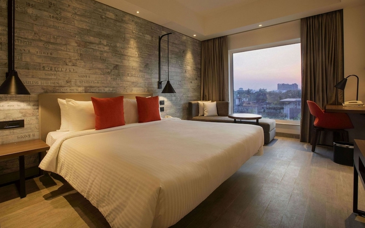 Imagen de la habitación del Hotel Lemon Tree Premier City Center Pune. Foto 8