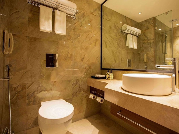 Imagen de la habitación del Hotel Lemon Tree Premier City Center Pune. Foto 12