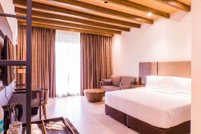 Imagen de la habitación del Hotel Lemon Tree Premier Corbett. Foto 3