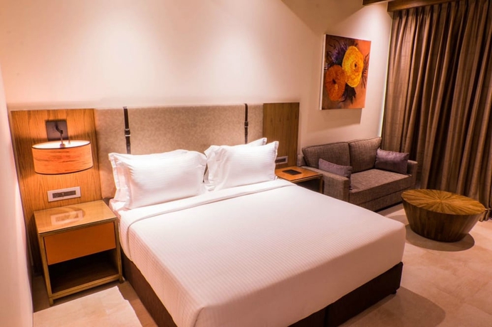 Imagen de la habitación del Hotel Lemon Tree Premier Corbett. Foto 6