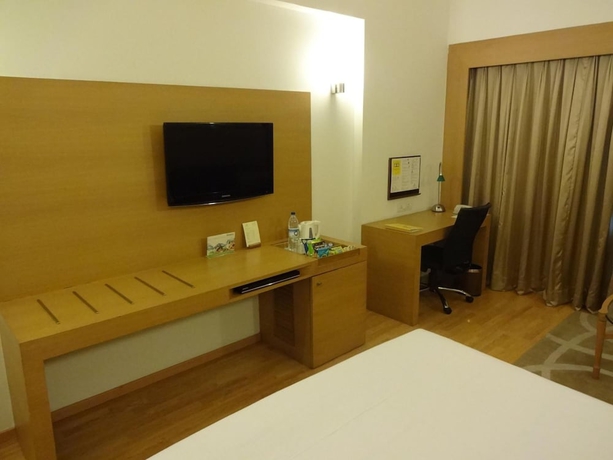 Imagen de la habitación del Hotel Lemon Tree Premier, HITEC City, Hyderabad. Foto 12