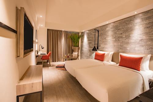 Imagen de la habitación del Hotel Lemon Tree Premier, Mumbai International Airport. Foto 3