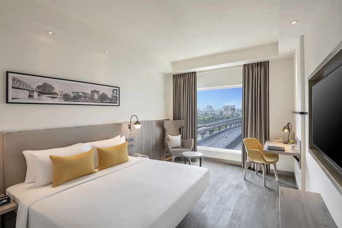 Imagen de la habitación del Hotel Lemon Tree Premier New Town Kolkata. Foto 10