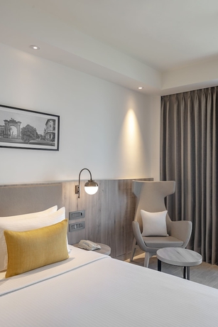 Imagen de la habitación del Hotel Lemon Tree Premier New Town Kolkata. Foto 11