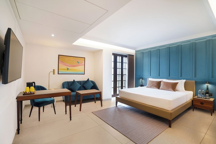 Imagen de la habitación del Hotel Lemon Tree Rajkot. Foto 4