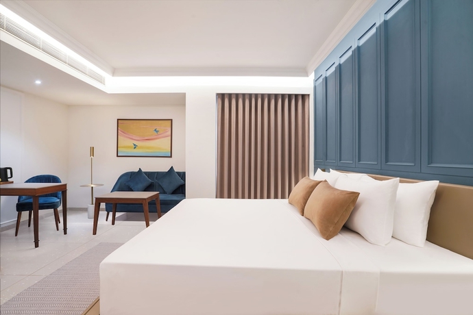 Imagen de la habitación del Hotel Lemon Tree Rajkot. Foto 5