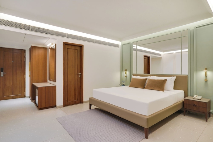 Imagen de la habitación del Hotel Lemon Tree Rajkot. Foto 7