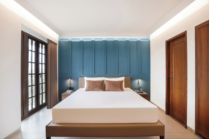 Imagen de la habitación del Hotel Lemon Tree Rajkot. Foto 8