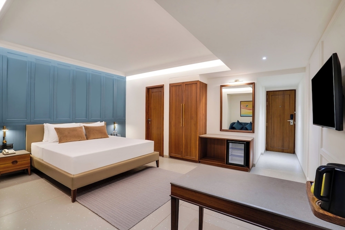 Imagen de la habitación del Hotel Lemon Tree Rajkot. Foto 9
