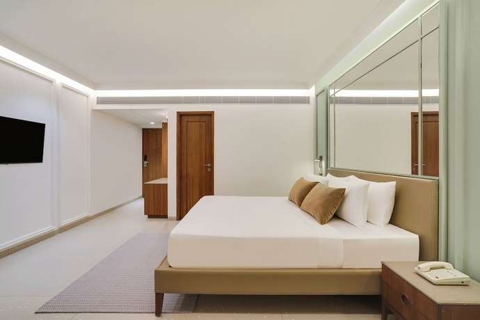 Imagen de la habitación del Hotel Lemon Tree Rajkot. Foto 12