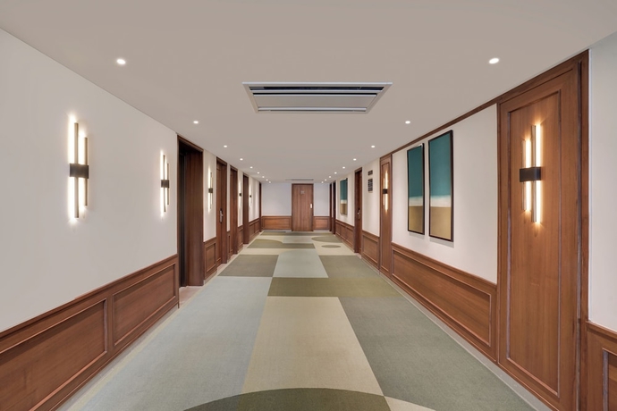 Imagen de la habitación del Hotel Lemon Tree Rajkot. Foto 13