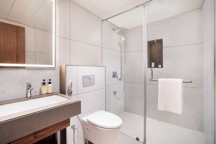 Imagen de la habitación del Hotel Lemon Tree Rajkot. Foto 14