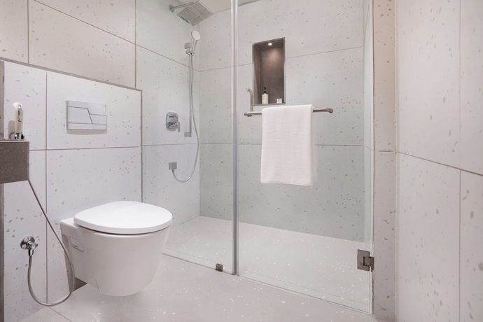 Imagen de la habitación del Hotel Lemon Tree Rajkot. Foto 15