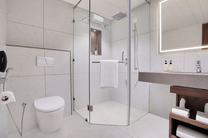 Imagen de la habitación del Hotel Lemon Tree Rajkot. Foto 19