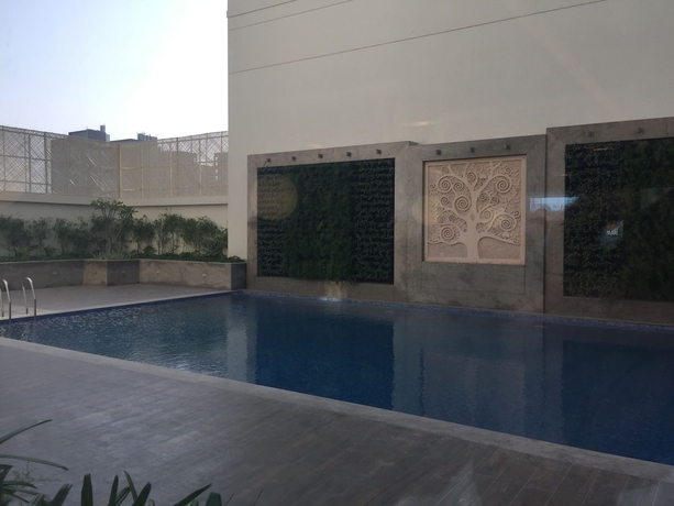 Imagen de la piscina del Hotel Lemon Tree , Sector 60, Gurugram. Foto 19