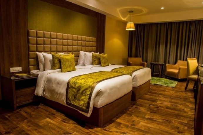 Imagen de la habitación del Hotel Lemon Tree Siliguri. Foto 6