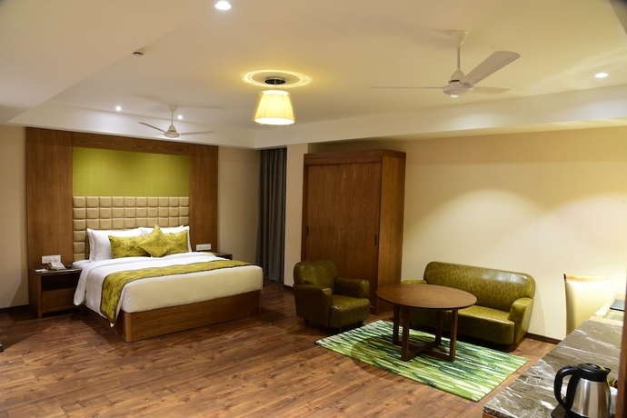 Imagen de la habitación del Hotel Lemon Tree Siliguri. Foto 8