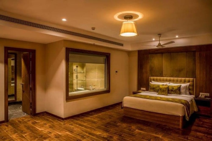 Imagen de la habitación del Hotel Lemon Tree Siliguri. Foto 10
