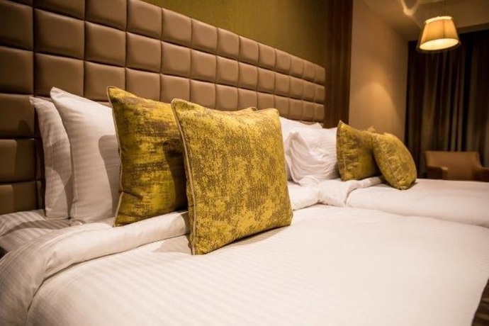 Imagen de la habitación del Hotel Lemon Tree Siliguri. Foto 12