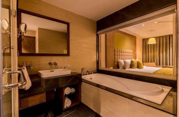 Imagen de la habitación del Hotel Lemon Tree Siliguri. Foto 16