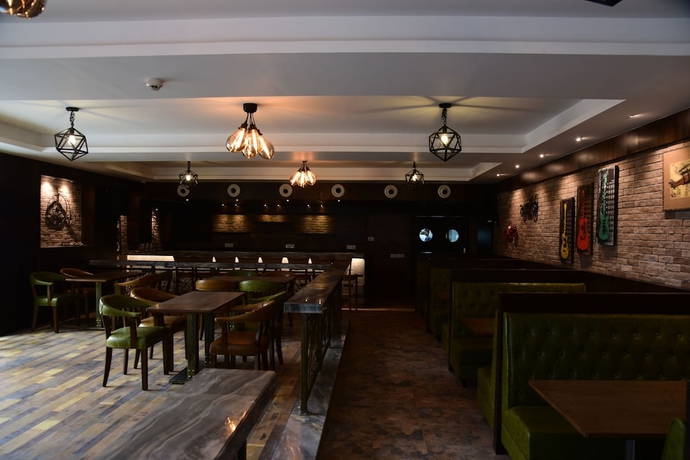 Imagen del bar/restaurante del Hotel Lemon Tree Siliguri. Foto 3