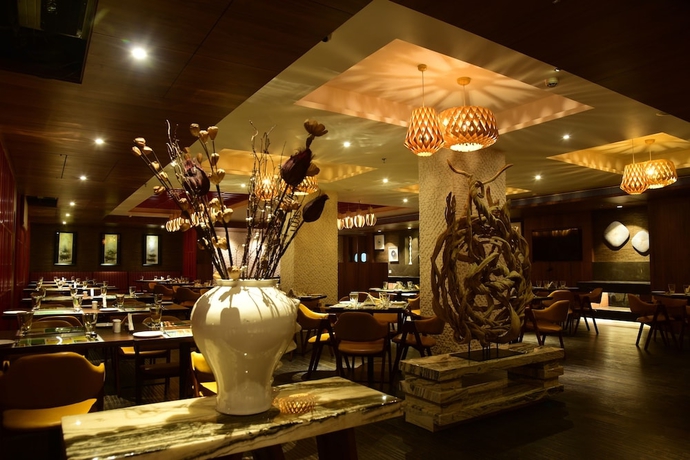 Imagen del bar/restaurante del Hotel Lemon Tree Siliguri. Foto 4
