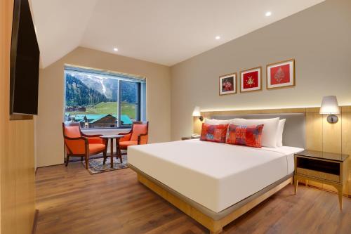 Imagen de la habitación del Hotel Lemon Tree, Sonamarg. Foto 17