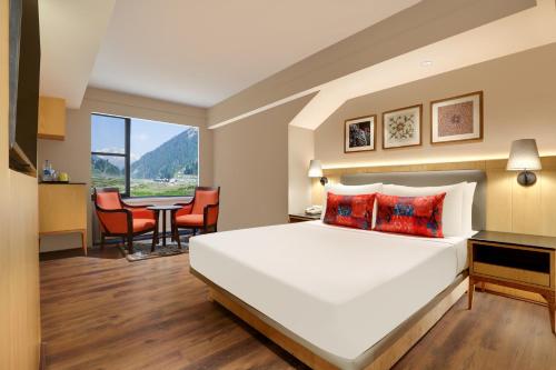 Imagen de la habitación del Hotel Lemon Tree, Sonamarg. Foto 18