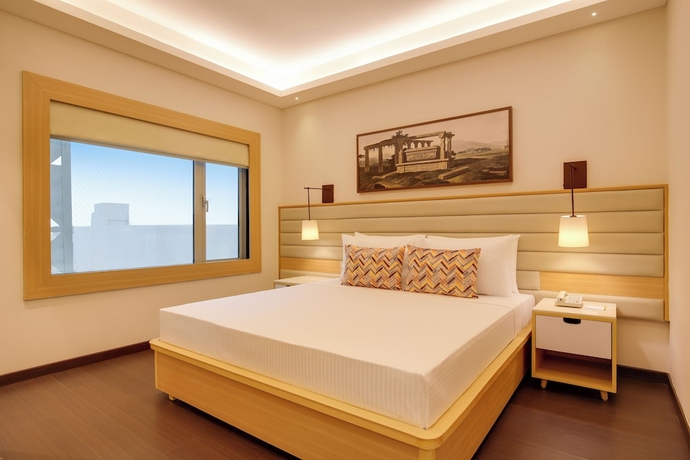 Imagen de la habitación del Hotel Lemon Tree Suites Gurugram. Foto 3