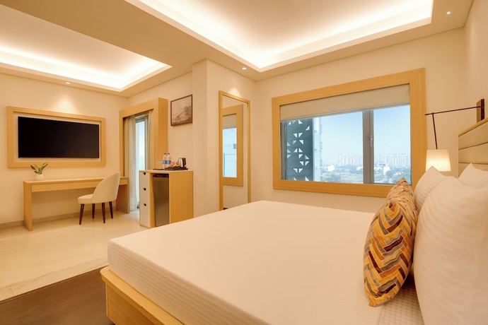 Imagen de la habitación del Hotel Lemon Tree Suites Gurugram. Foto 5