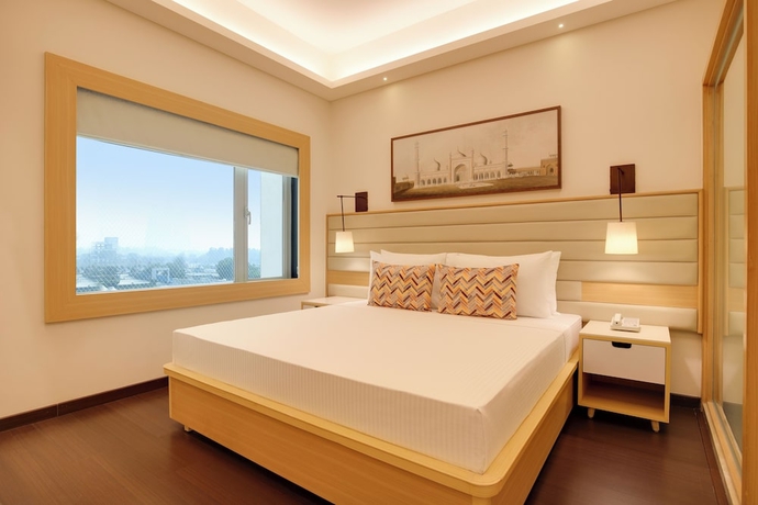 Imagen de la habitación del Hotel Lemon Tree Suites Gurugram. Foto 7