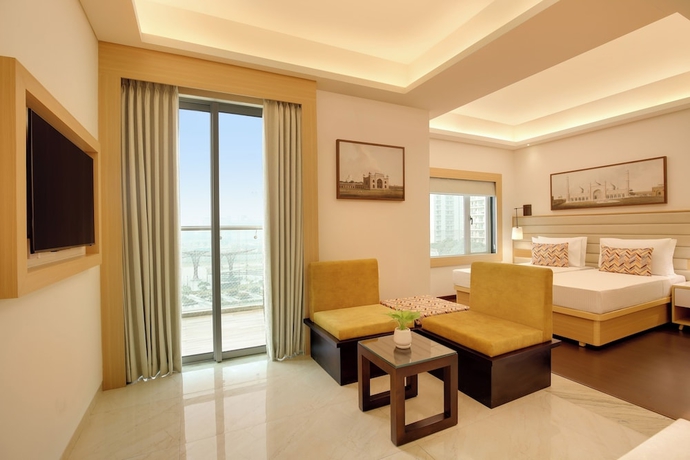 Imagen de la habitación del Hotel Lemon Tree Suites Gurugram. Foto 9