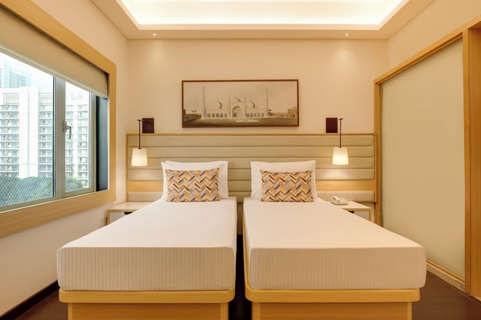 Imagen de la habitación del Hotel Lemon Tree Suites Gurugram. Foto 10