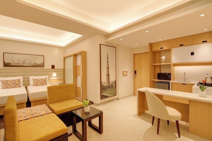 Imagen de la habitación del Hotel Lemon Tree Suites Gurugram. Foto 11