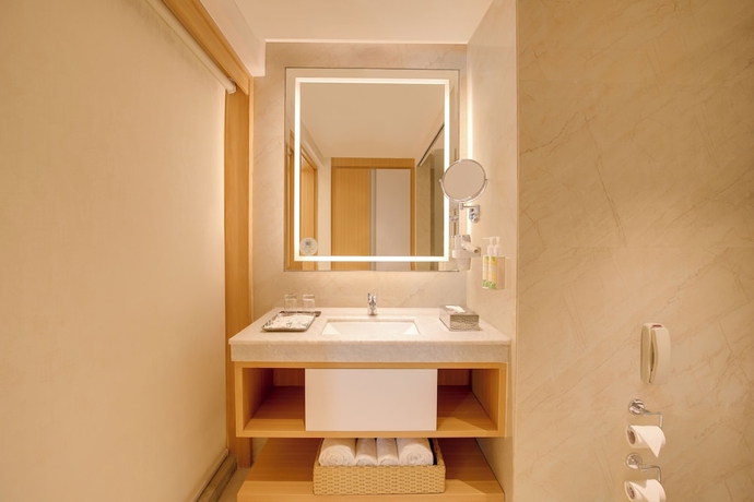 Imagen de la habitación del Hotel Lemon Tree Suites Gurugram. Foto 12