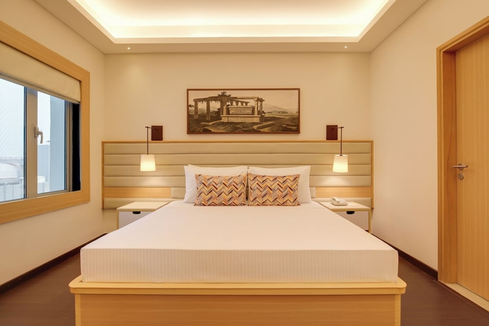Imagen de la habitación del Hotel Lemon Tree Suites Gurugram. Foto 13