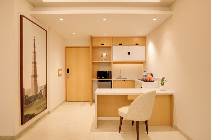 Imagen de la habitación del Hotel Lemon Tree Suites Gurugram. Foto 14