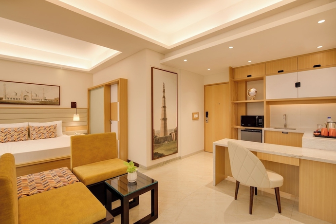 Imagen de la habitación del Hotel Lemon Tree Suites Gurugram. Foto 15