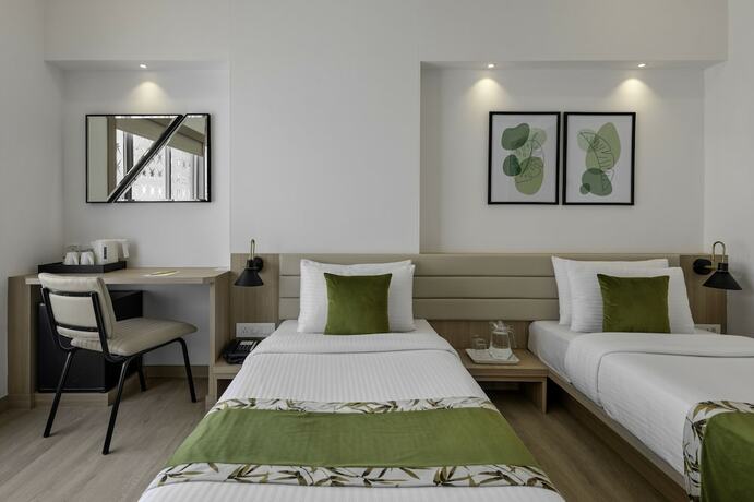 Imagen de la habitación del Hotel Lemon Tree Vadodra. Foto 25