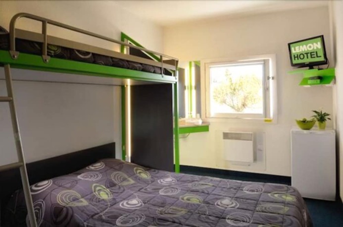 Imagen de la habitación del Hotel Lemon Vigneux. Foto 15