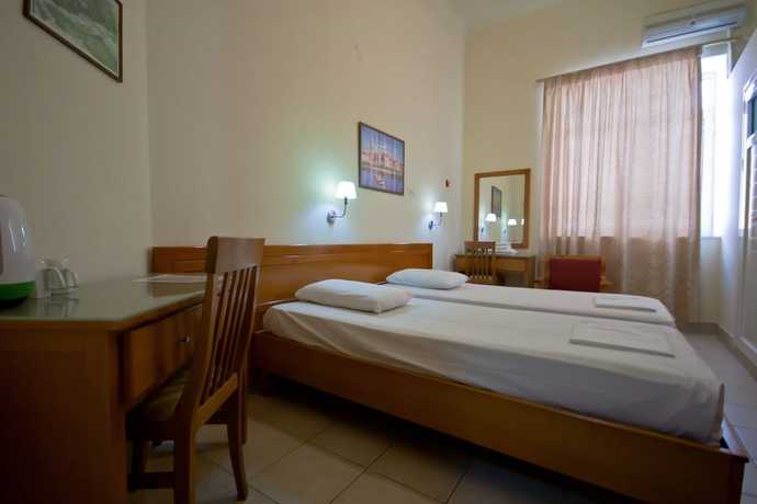 Imagen de la habitación del Hotel Lena, Heraklion. Foto 18