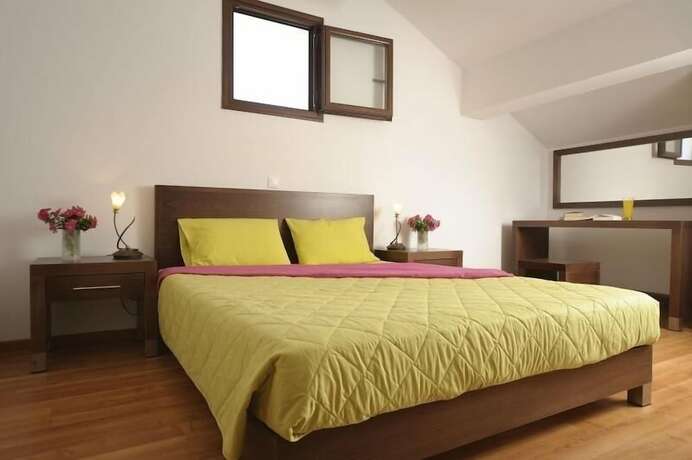 Imagen de la habitación del Hotel Lenikos Resort. Foto 16