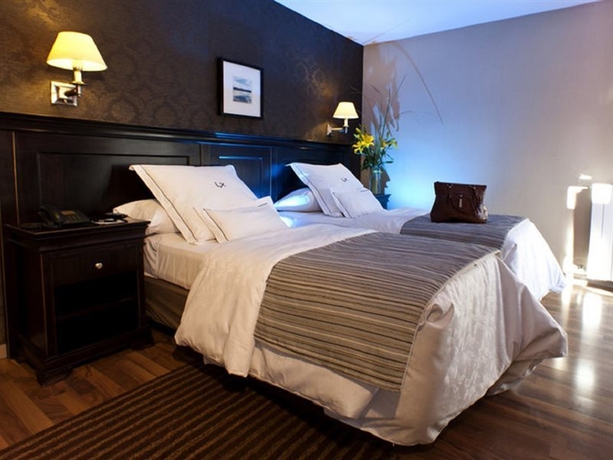 Imagen de la habitación del Hotel Lennox Ushuaia. Foto 6