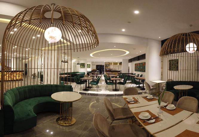 Imagen del bar/restaurante del Hotel Len's Hotel. Foto 3