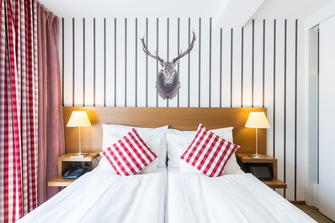 Imagen de la habitación del Hotel Lenzerhorn Spa and Wellness. Foto 2