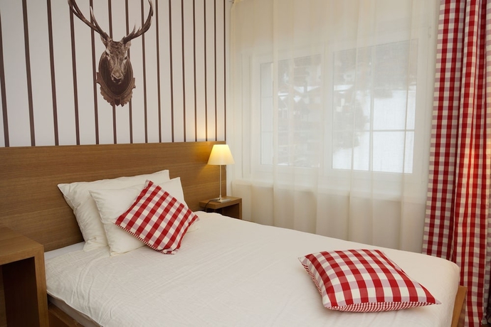 Imagen de la habitación del Hotel Lenzerhorn Spa and Wellness. Foto 13