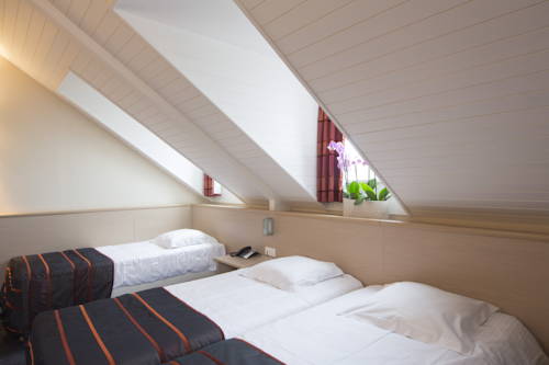 Imagen de la habitación del Hotel Leo Station, Villa Et Annexes. Foto 7