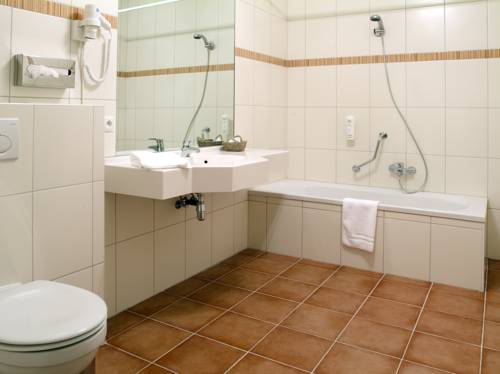 Imagen de la habitación del Hotel Leo Station, Villa Et Annexes. Foto 13