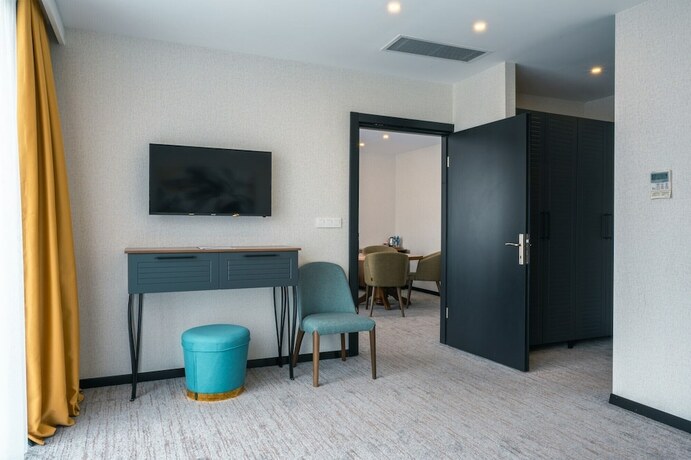 Imagen de la habitación del Hotel Leo Suites. Foto 12
