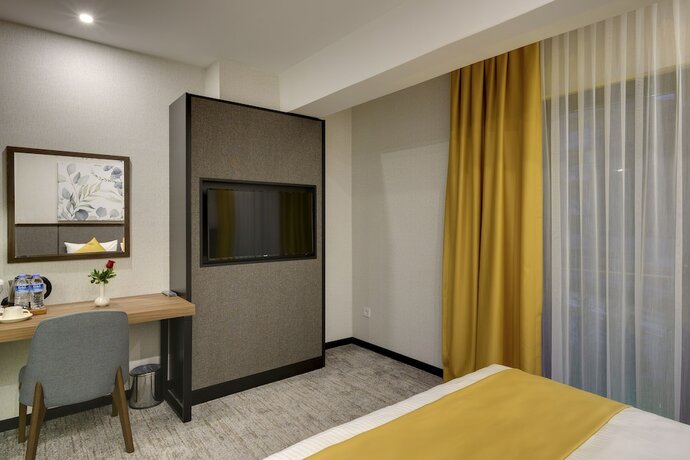 Imagen de la habitación del Hotel Leo Suites. Foto 14